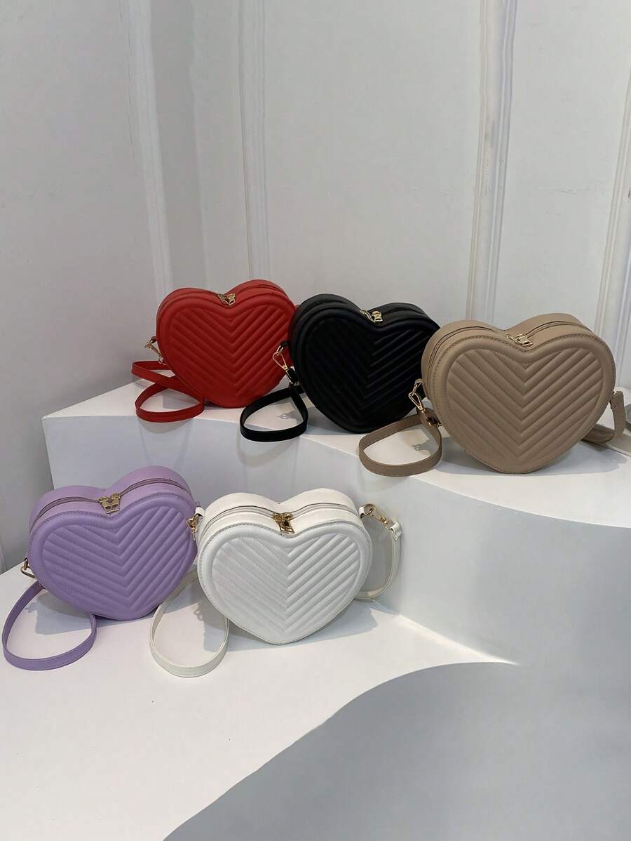 1 pieza Bolso pequeño de unicolor simple y elegante para niñas, nueva bolsa de mensajero de hombro con textura en forma de corazón, material de PU, bolso de corazón de niña de moda, bolso de mensajero de hombro a cuadros elegante y versátil con cierre de cremallera, muy adecuado para salidas y citas