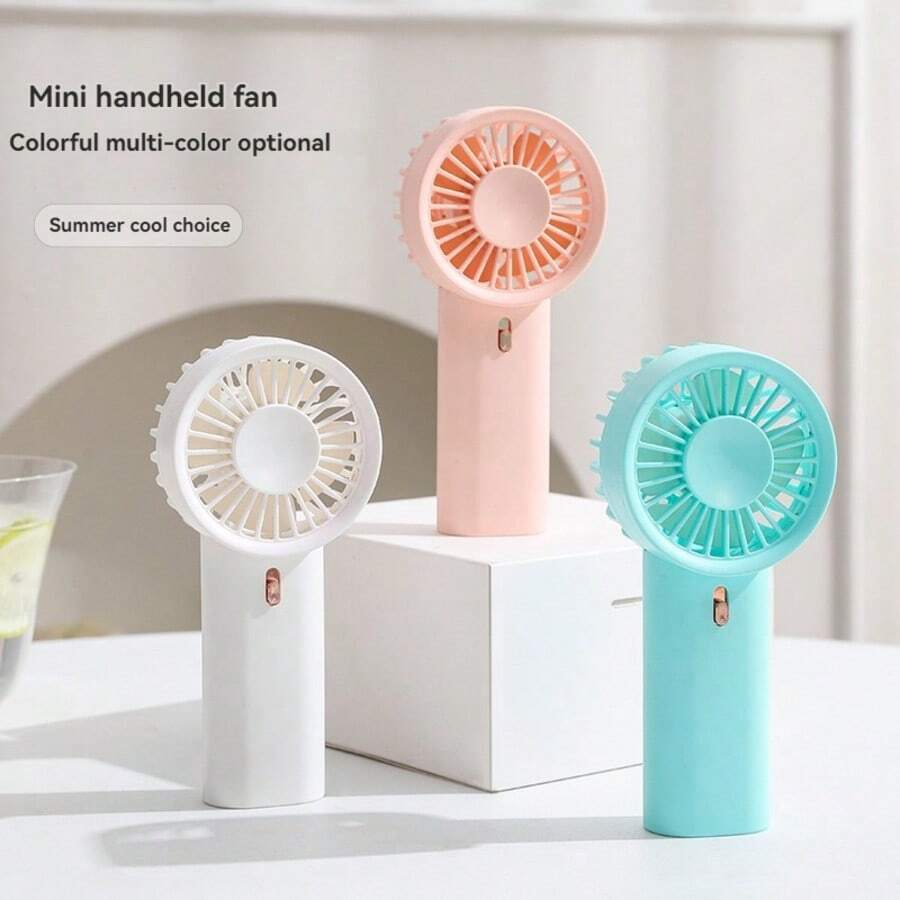 1 pieza Mini ventilador de mano para volver a la escuela con 2 pilas AA (pilas no incluidas)