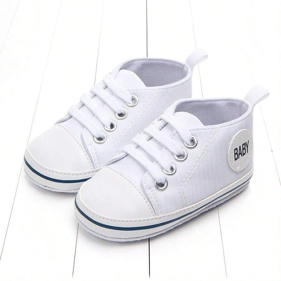 Zapatos blancos para bebé, diseño simple de cordones para niños y niñas, moda suave, suela antideslizante, zapatos planos para recién nacidos