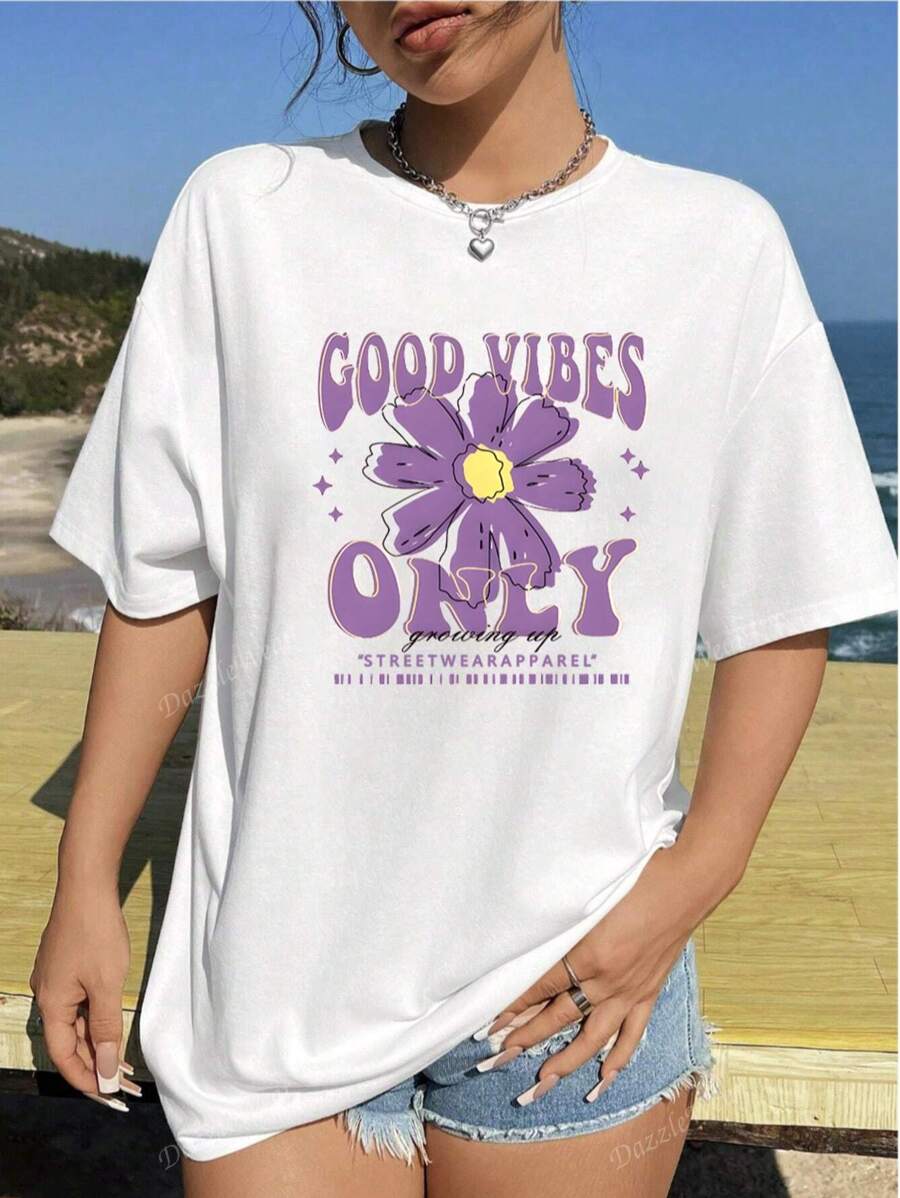 T-shirt casual a maniche corte con collo tondo, grafica floreale e slogan "GOOD VIBES ONLY", magliette grafiche da donna