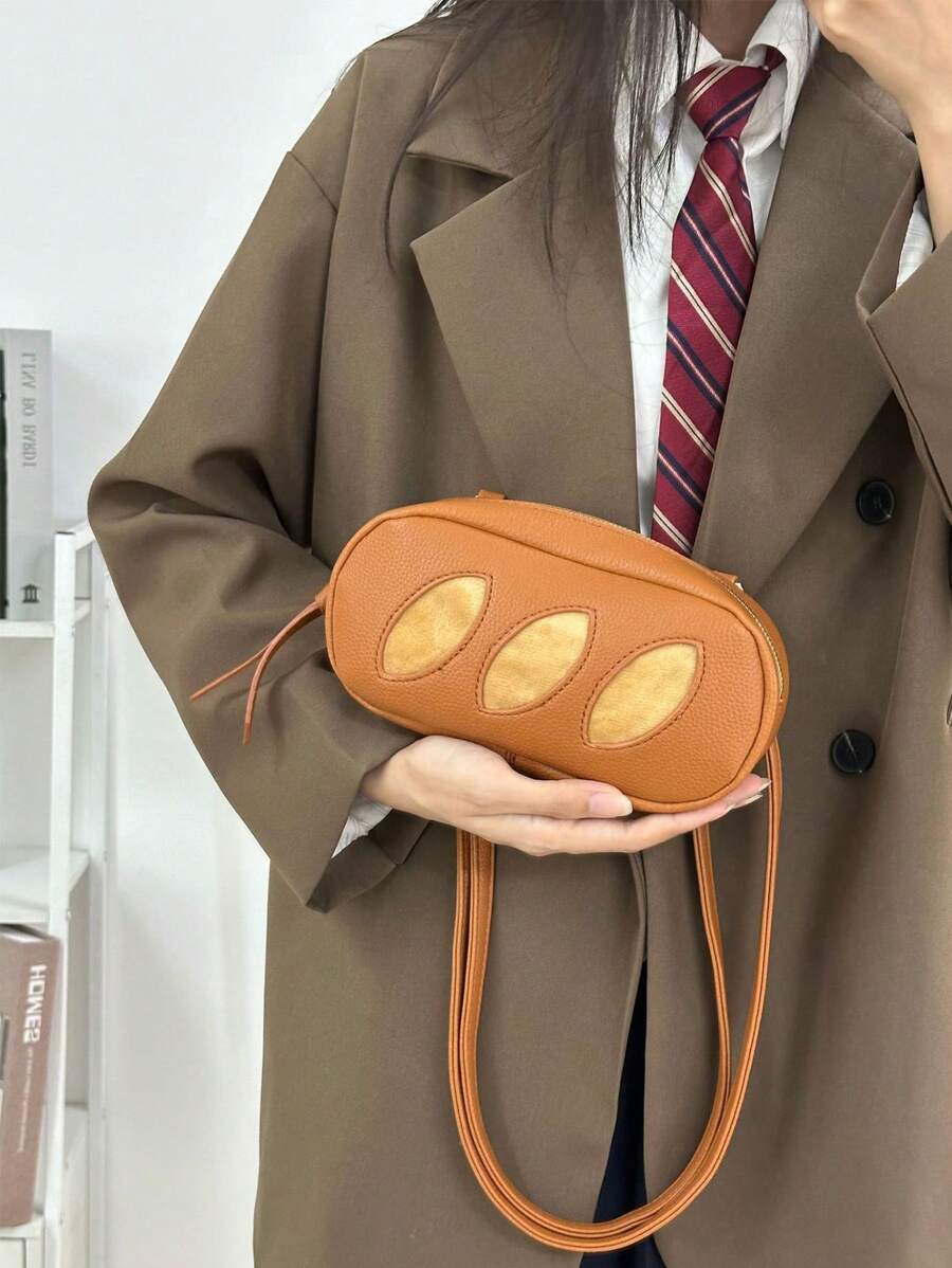 2025 Nouveau sac cosmétique créatif et mignon en forme de pain fait main, avec style de niche. Sac bandoulière croisé