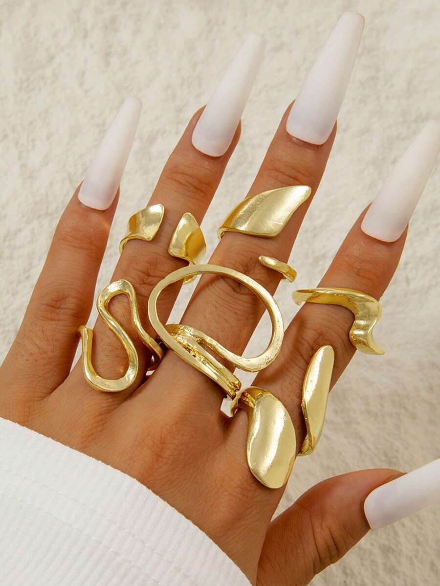Juego de 4 anillos curvos con diseño sencillo y asimétrico con efecto hueco