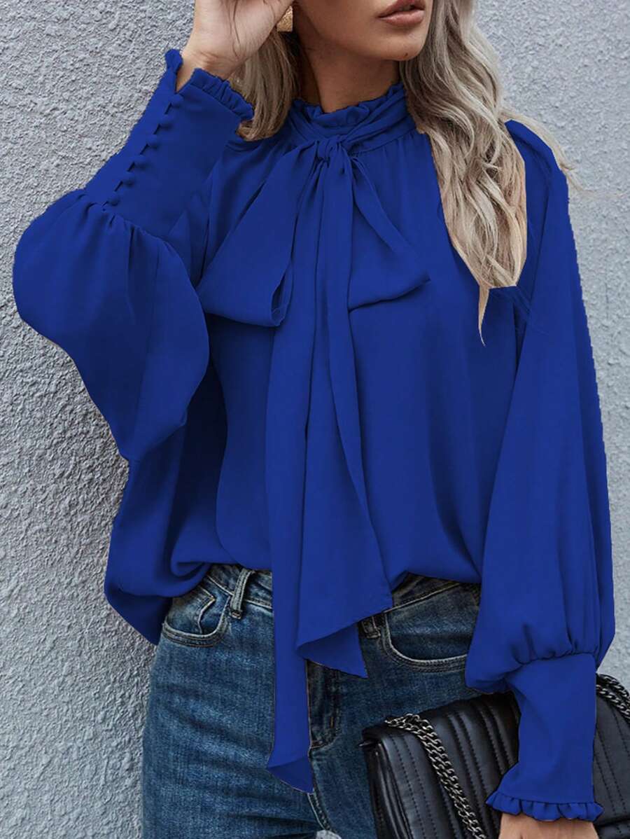 Blusa de manga larga con botón, lazo y estilo suelto de unicolor, estilo europeo y americano para mujeres