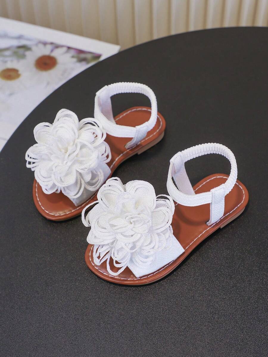 Un par de sandalias para niñas Nuevos zapatos de princesa con lazo, diseño de banda elástica, suela blanda, zapatos casuales de playa para niñas en verano.