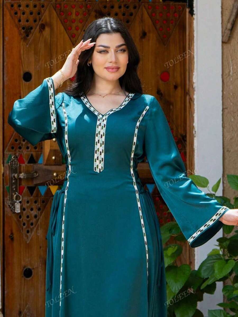 Vestido largo de mangas largas árabe de moda y elegante para mujer