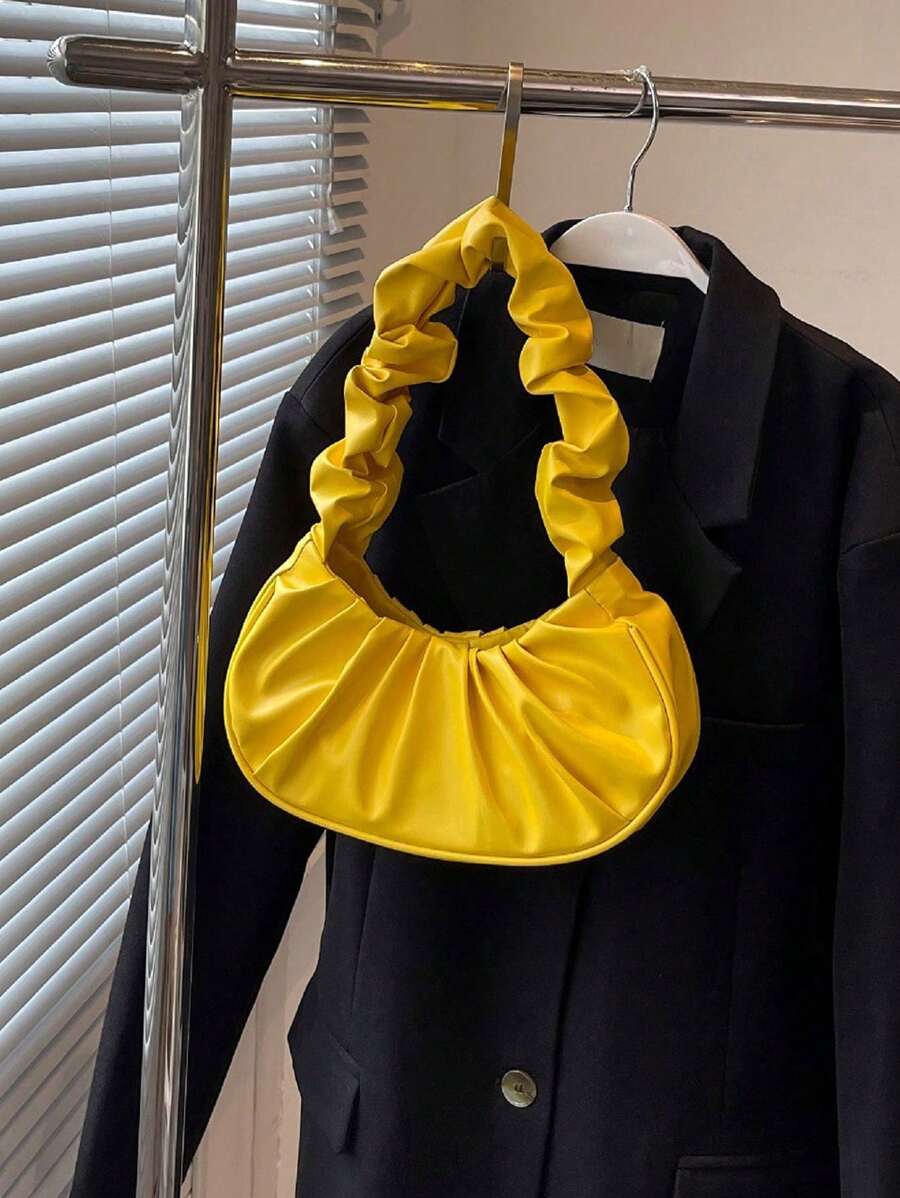 Nuevo bolso de mujer de moda en forma de media luna, personalizado, plegable y portátil, de estilo de red de colores, bolso de hombro en color amarillo mantequilla de moda para mujeres