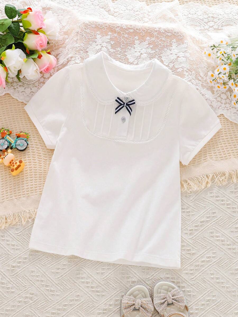 Blusa con cuello con volantes y decoración de moño elegante para niñas, parte superior casual de unicolor estilo universitario, moda de verano para niñas preadolescentes
