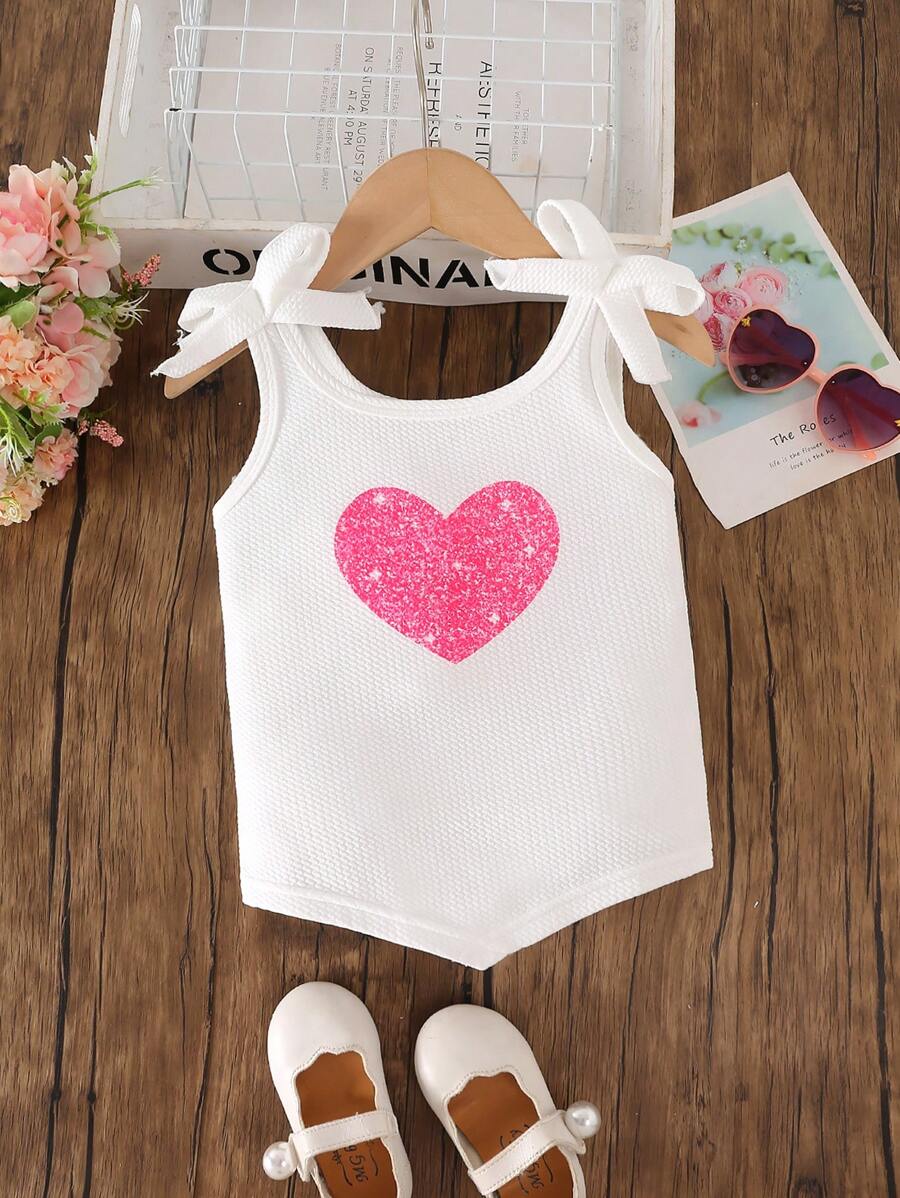 Top estivi senza maniche da ragazza, casual e carini, con decorazione a fiocco e stampa a cuore, versatili per uscite e uso quotidiano