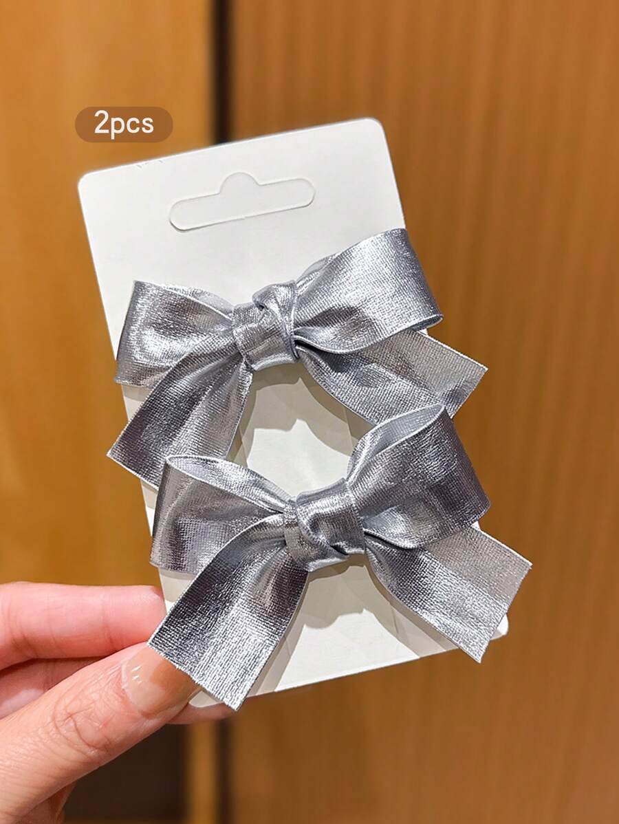 2 Stück Silberne Schleifenförmige Haarclips, modische und niedliche Haraccessoires für den täglichen Gebrauch - Haarklammern, Haarspangen