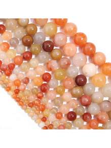 Perles de jade en soie dorée