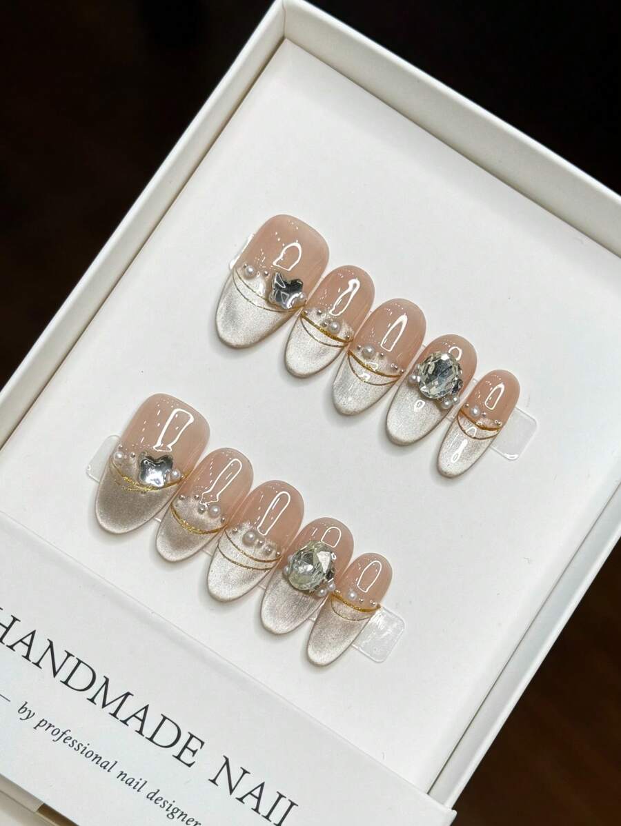 Accesorios para uñas: Nuevo diseño de primavera con ojos de gato, perlas, lazos y piedras preciosas. Uñas postizas de estilo adhesivo.
