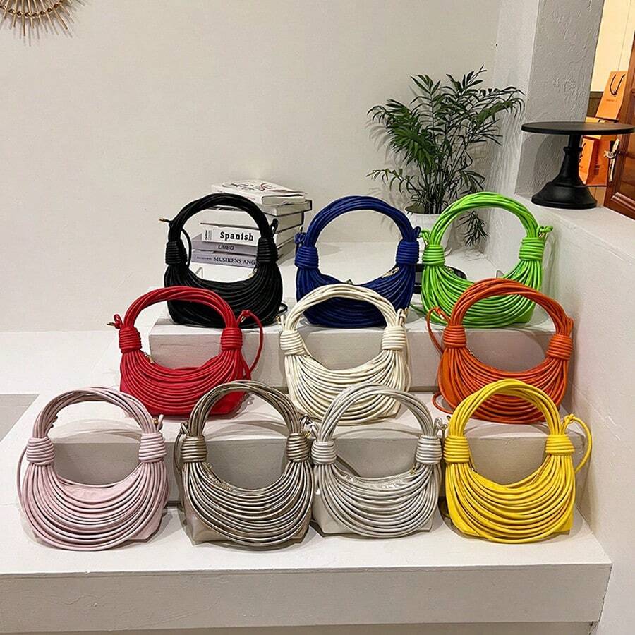 Sacs pour femmes 2025 Nouveaux sacs à nœuds de mode coréenne Sacs à bandoulière populaires tissés texturés multicolores Sacs à main en pain tissés faits à la main pour femmes avec poignée supérieure Sacs à bandoulière à bandoulière Sac à main créatif pour nouilles Sac à main sous les bras