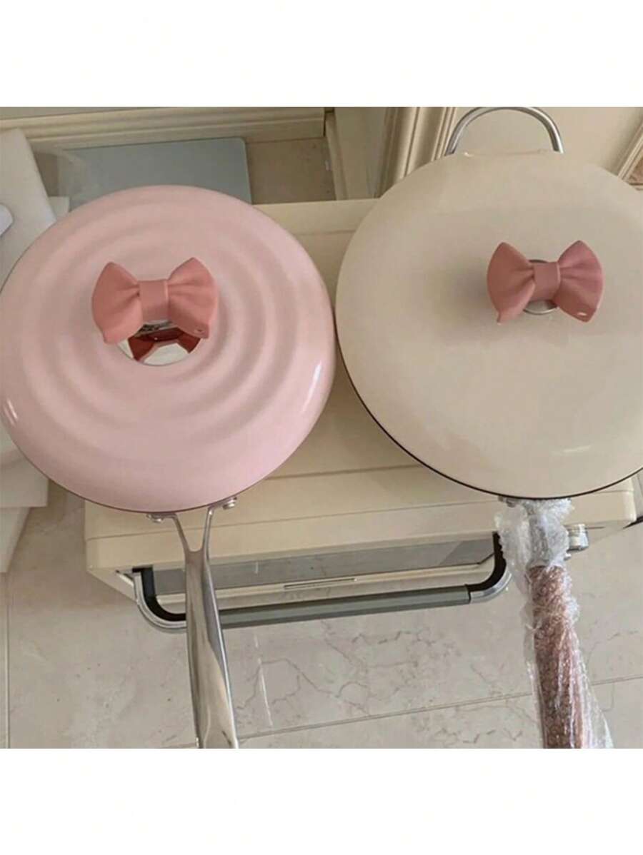 Mignon clip antibrûlure en silicone en forme de nœud. Clip d'isolation créatif en nœud en silicone résistant à haute température pour protéger les oreilles
