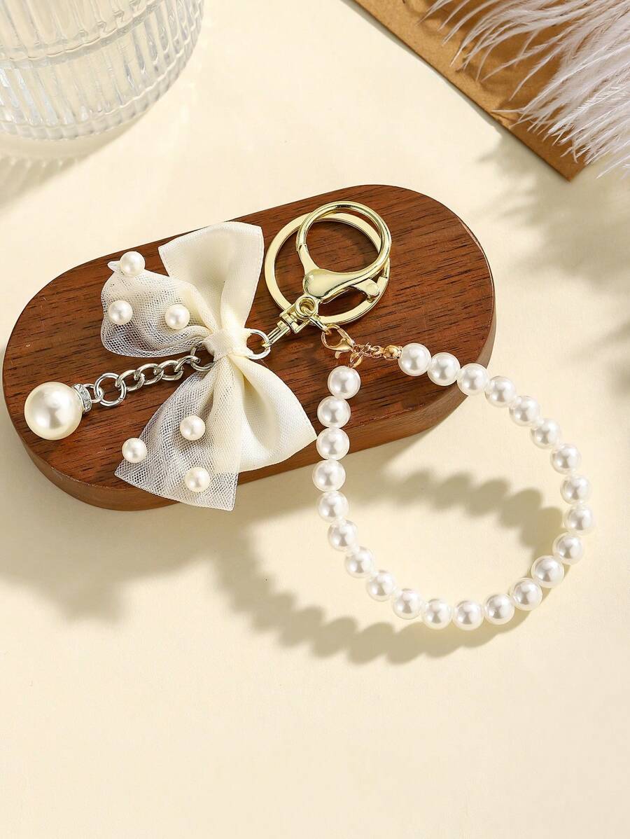 1pc Elegant Oversized Bow Pearl Keychain, Fashion Handbag Accessory With Gold-Color Hardware, Suitable For Bags And Phone Cases, Ideal Gift For Various Holidays