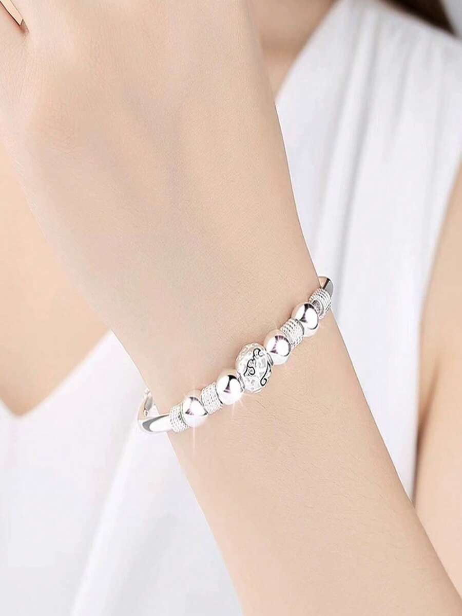 1 Stück luxuriöses elegantes ovales Perlen Armband mit Hohlblüten, Silber 925 plattiert, exquisites rotierendes Kupferball Design Armband. Vielseitiger Schmuckdekor, ein tolles Geschenk für Frauen zu Feiertagen und Geburtstagen