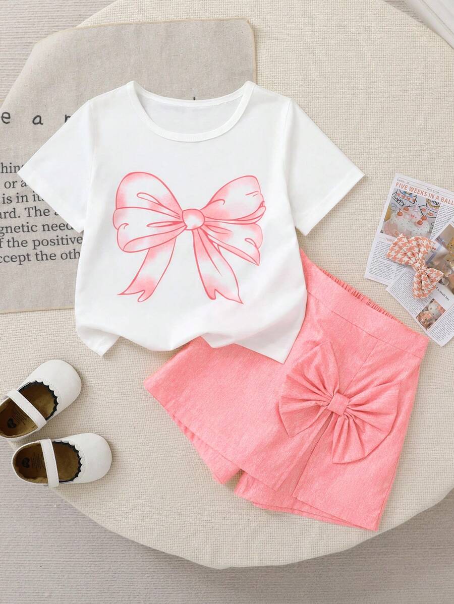 Set de 2 piezas con top de manga corta blanco con estampado de mariposa y pantalón corto falda rosa para niña joven, estilo casual y elegante, apropiado para salidas y vacaciones, para verano