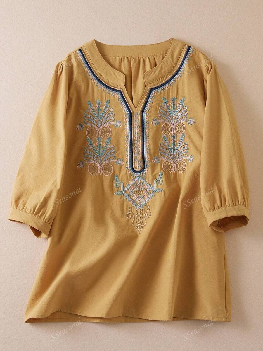 Blusa de verano casual de mujer con cuello en V, mangas abultadas y bordado de unicolor