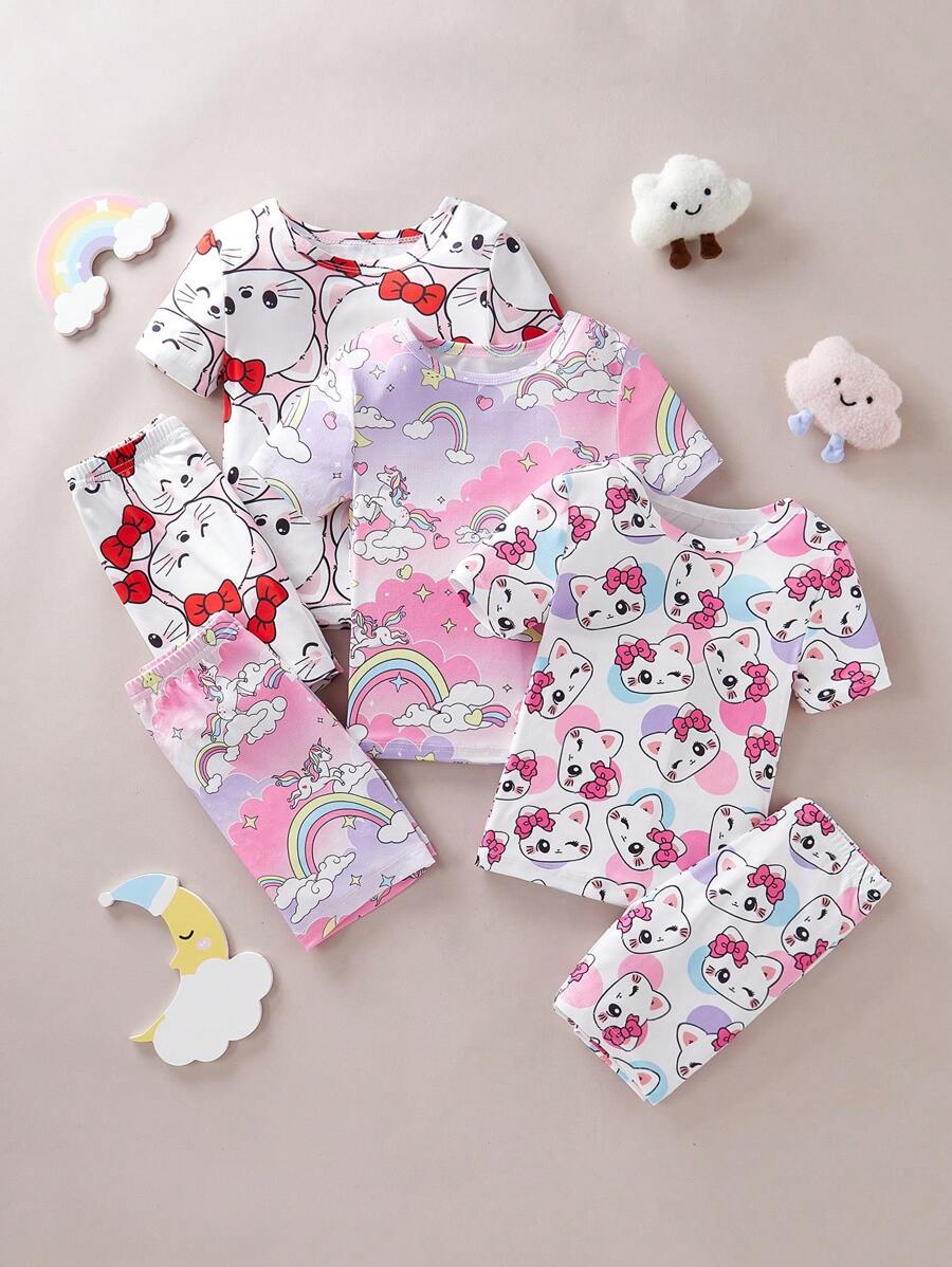 Set de 3 piezas de pijama ajustado con camiseta de manga corta y pantalones cortos con estampados de mariposa, corazón y flor para niñas pequeñas