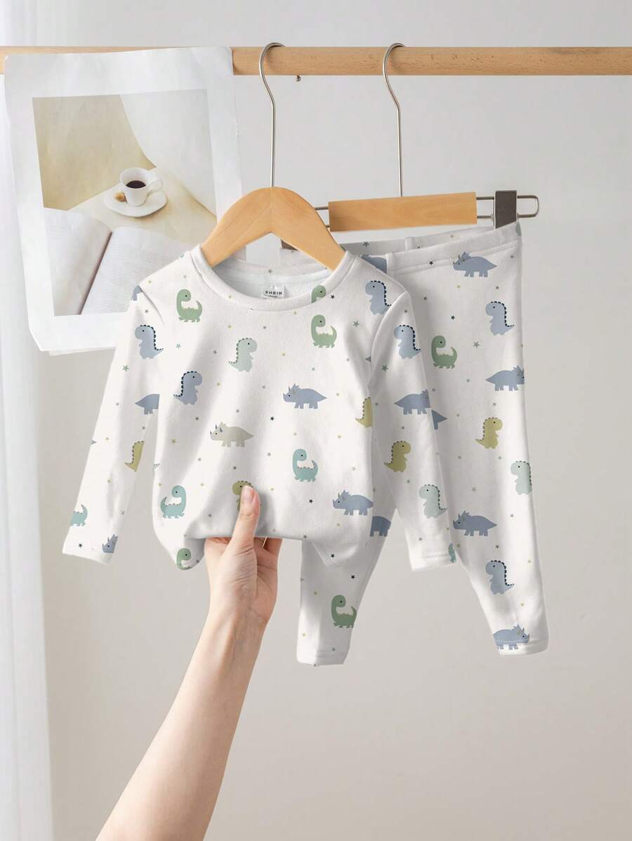 SHEIN Young Boy Dinosaur Graphic Casual Minimalist Snug Fit Long Sleeve Crew Neck Top And Long Pants Sleepwear, Thick Stretchy Suitable For Autumn/Winter