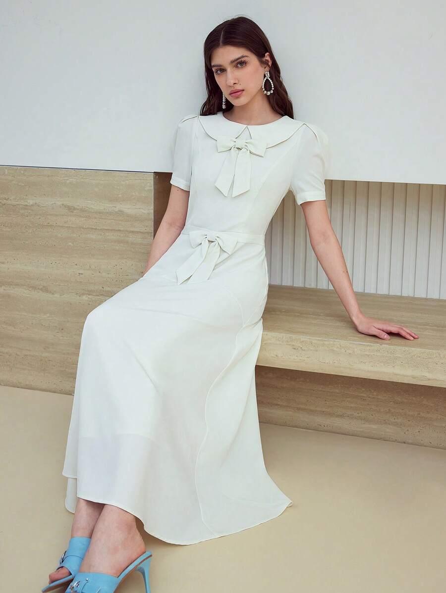 MOTF STUDIO VESTIDO CON MANGA ABULLONADA Y DECORACIÓN DE LAZO