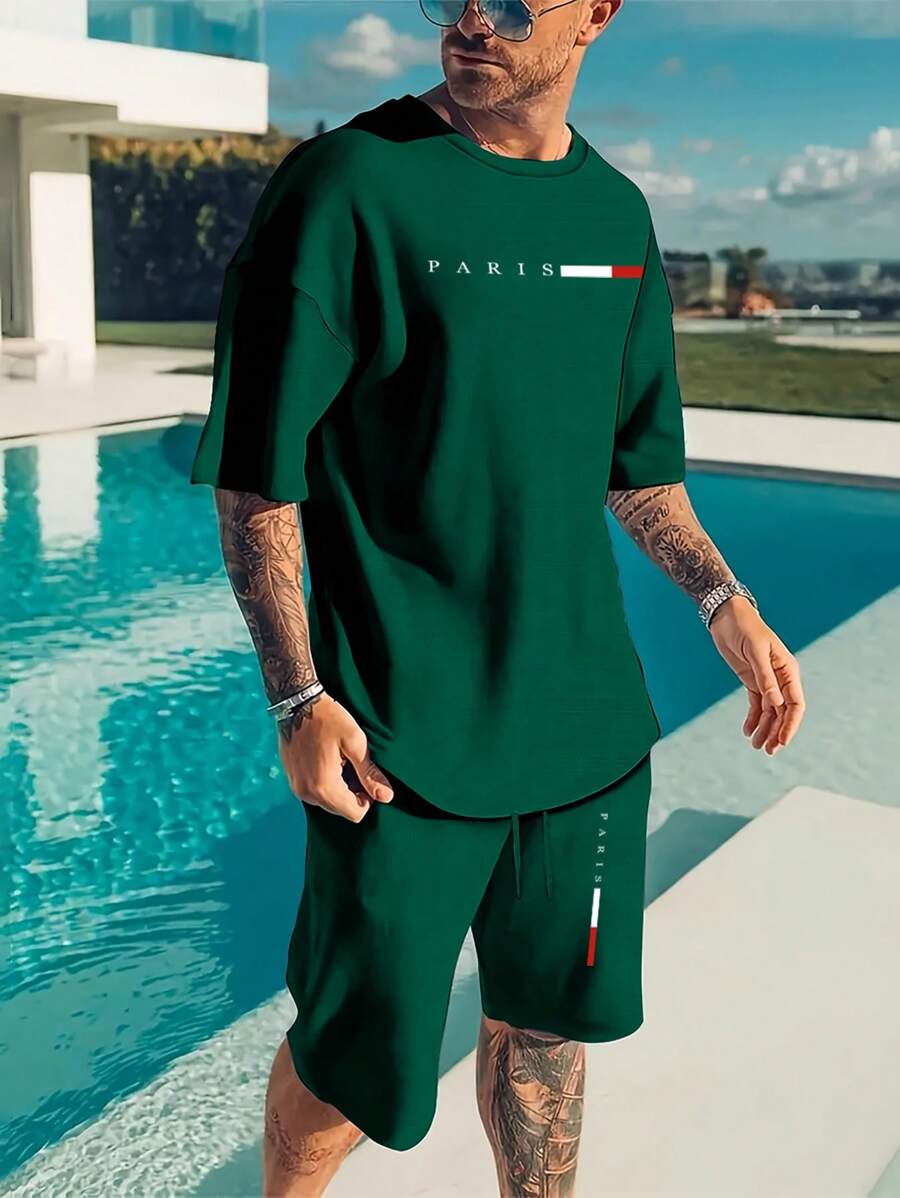 Manfinity Homme Set casual da uomo composto da t-shirt a maniche corte con collo rotondo e stampa di lettere, e pantaloncini, outfit estivo da 2 pezzi per uomo