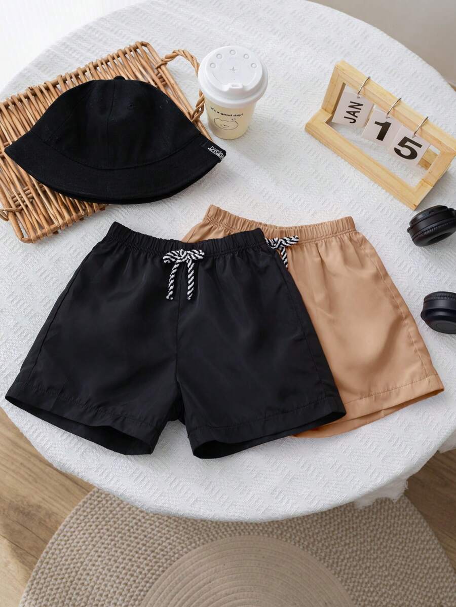SHEIN Conjunto de 2 peças de shorts casuais confortáveis e modernos, práticos e fofos, macios e respiráveis para meninos, adequados para férias, uso diário, escola, viagens, esportes, primavera e verão, roupa de banho para meninos, sunga para meninos, roupa de banho para meninos, sunga para meninos, verão
