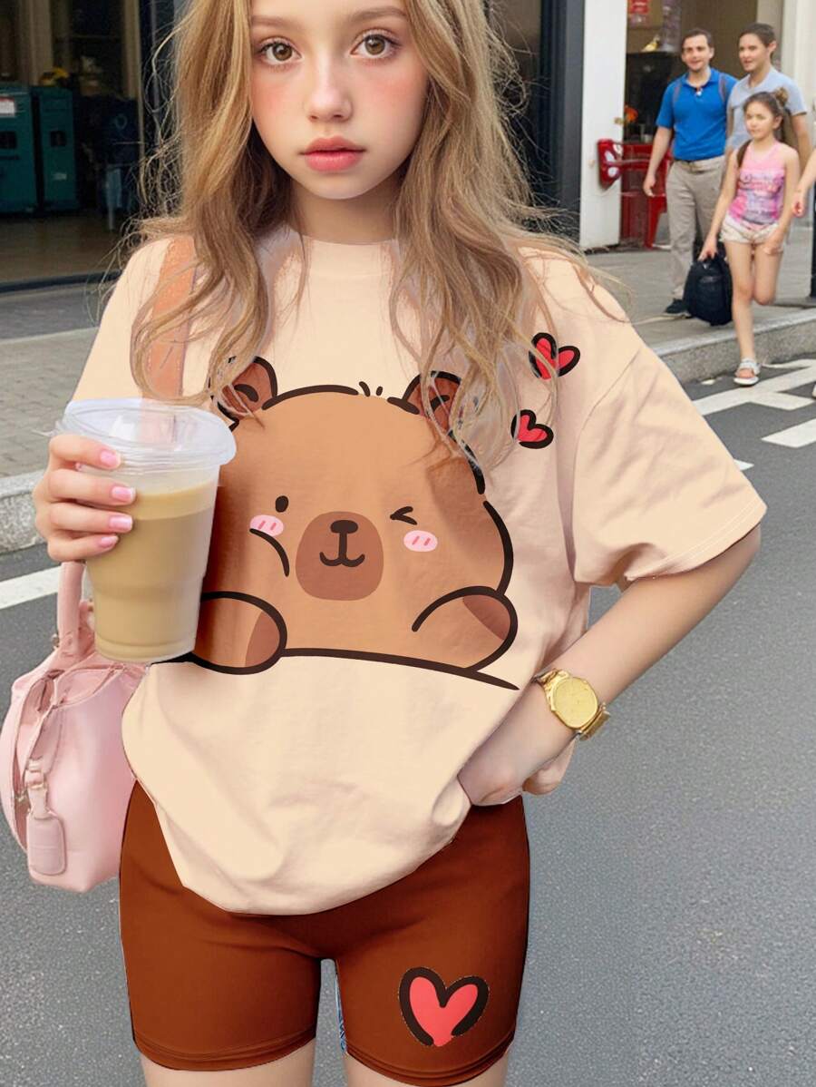 SHEIN Conjunto de 2 piezas de camiseta de manga corta y pantalones cortos con estampado de Capibara de dibujos animados, estilo casual y minimalista, apropiado para niñas adolescentes en verano