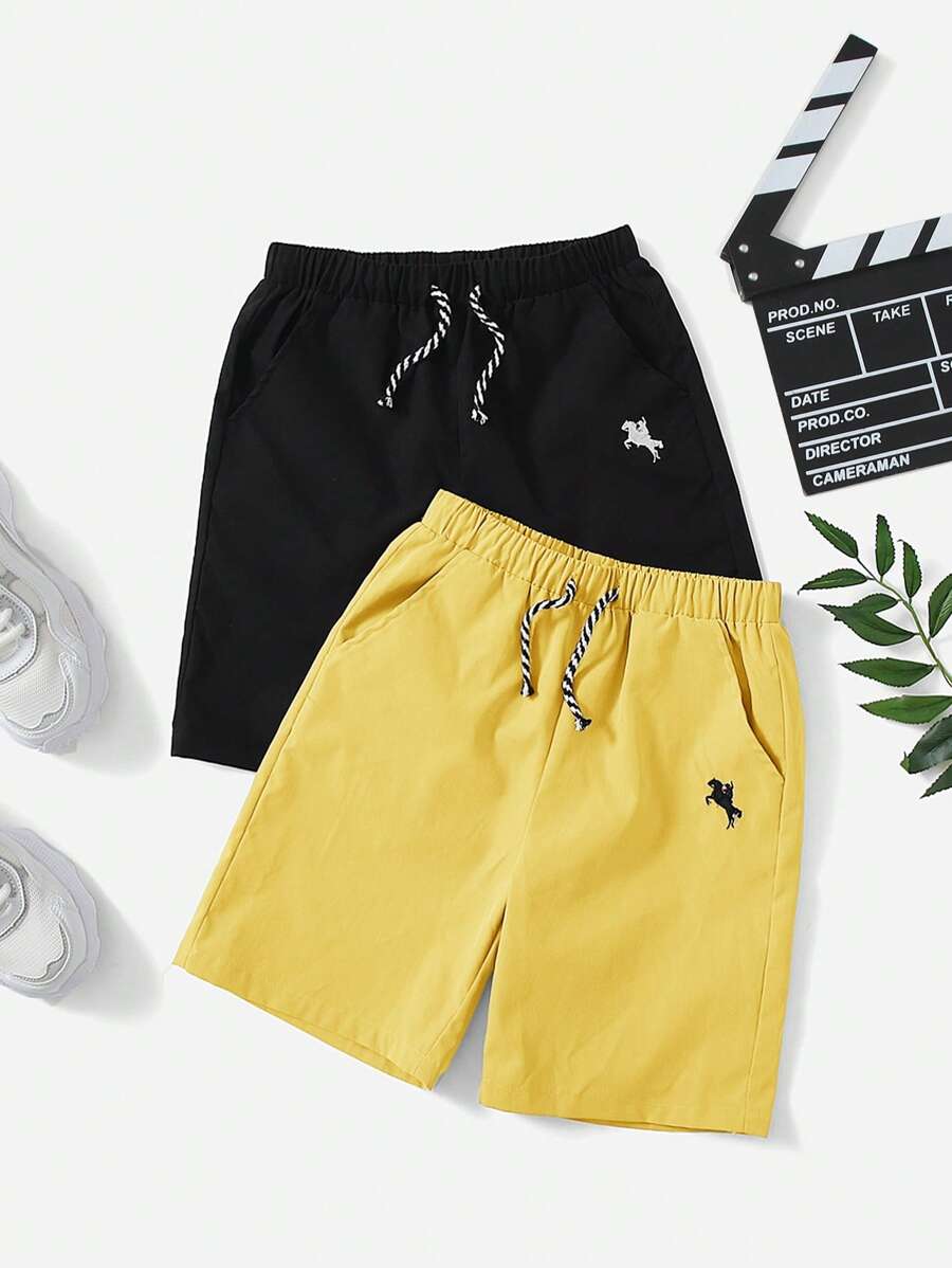 SHEIN Pantalones cortos informales de verano para niños preadolescentes con bolsillo sesgado y cintura con cordón