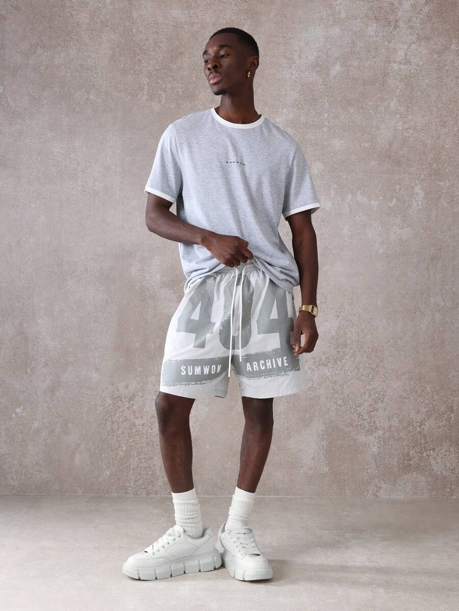 SUMWON Pantalones cortos tipo drop crotch de nailon atlético con estampado gráfico del archivo Sumwon, cintura con cordón cómoda, ajuste relajado, para entrenamiento, correr, baloncesto, ropa deportiva de verano y uso urbano