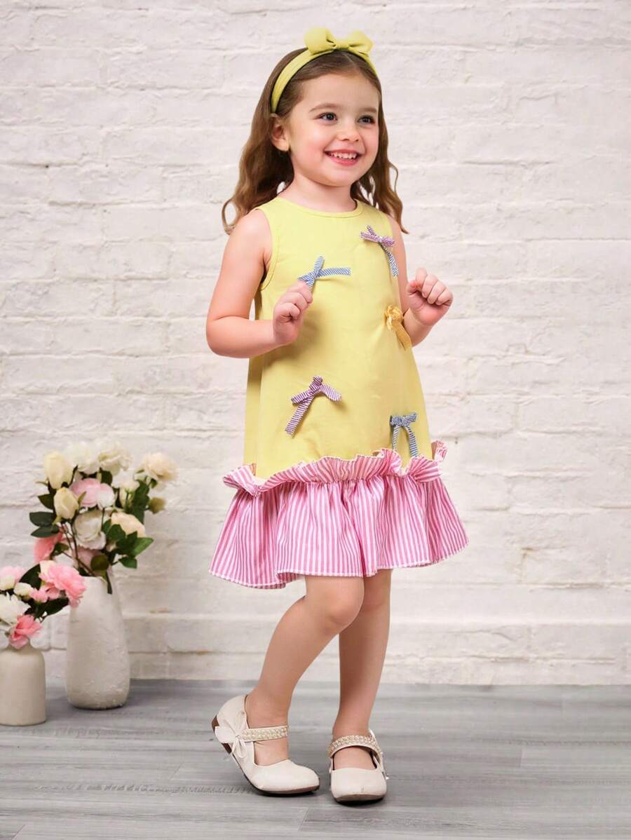 Vestido casual sin mangas de cuello redondo con parches y lazo para niñas, nuevo diseño para primavera y verano