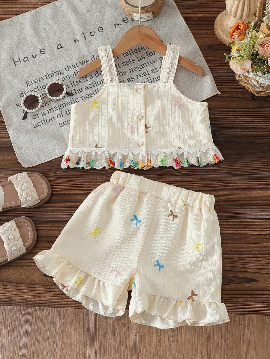 SHEIN Conjunto de 2 piezas para niñas pequeñas con blusa de tirantes con bordado floral de jardín y pantalones cortos - Blusa de tirantes con volantes + pantalones cortos, lindo y dulce look de moda