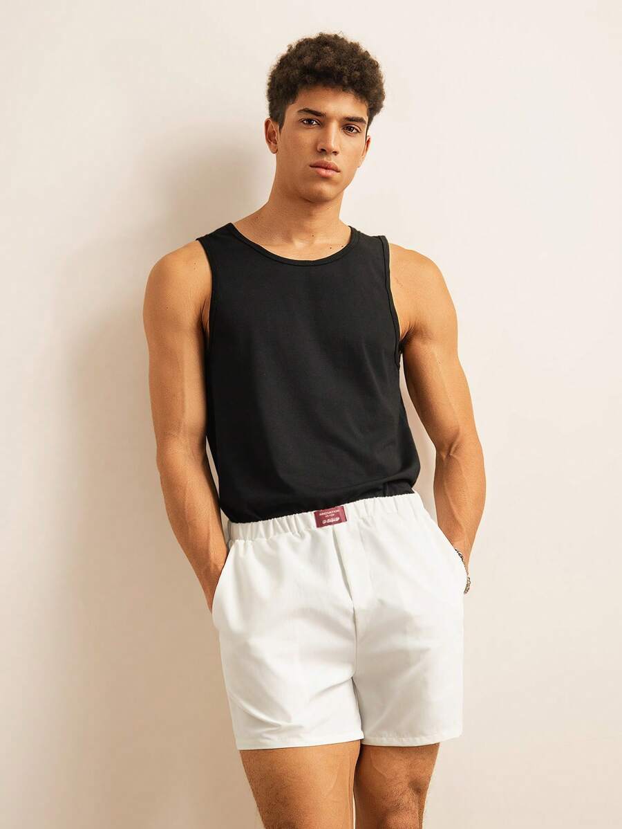 Manfinity Unisex Assorted Sizes Elastic Waist Patchwork Hem Men's Loose Fit Shorts