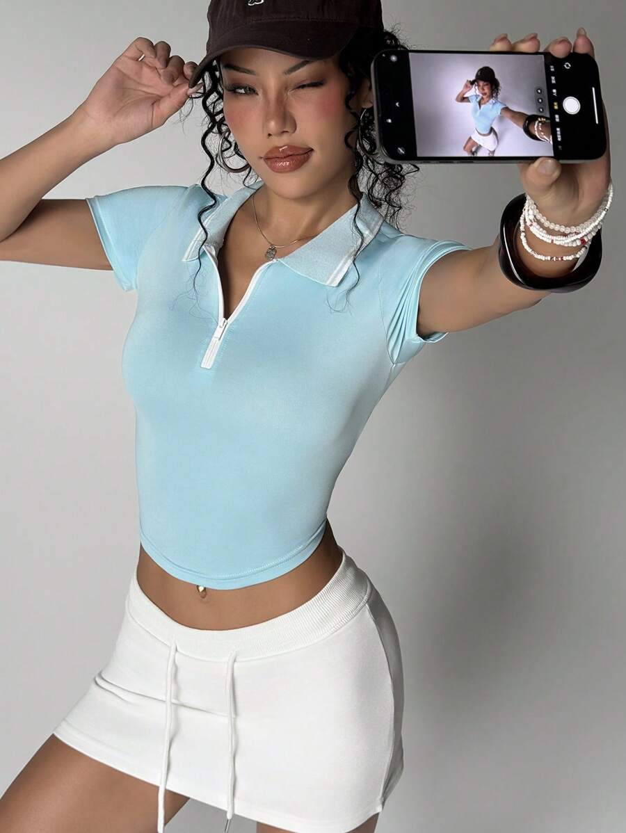 SHEIN Sport Studio Camiseta de polo de deporte deportiva de manga corta con cremallera para uso diario para mujeres
