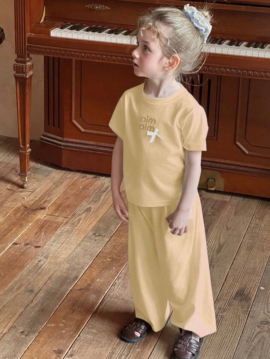 DAZY Conjunto de 2 piezas: Camiseta de cuello redondo de manga corta y pantalón largo para niña, de moda para el verano