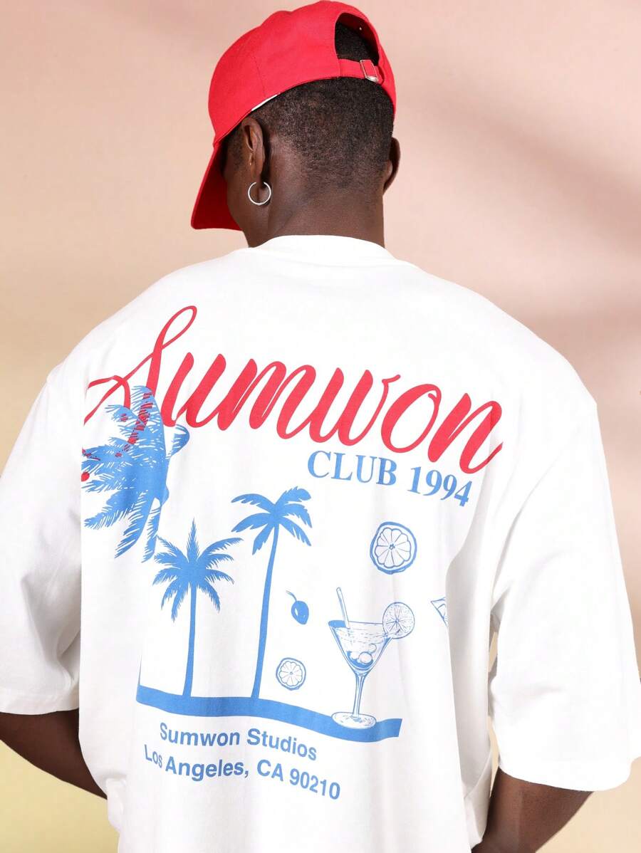 SUMWON Camiseta de algodón unisex de estilo retro y urbano con gráfico de palmera, playa y cóctel de las vacaciones de verano de Club 1994 Studios California