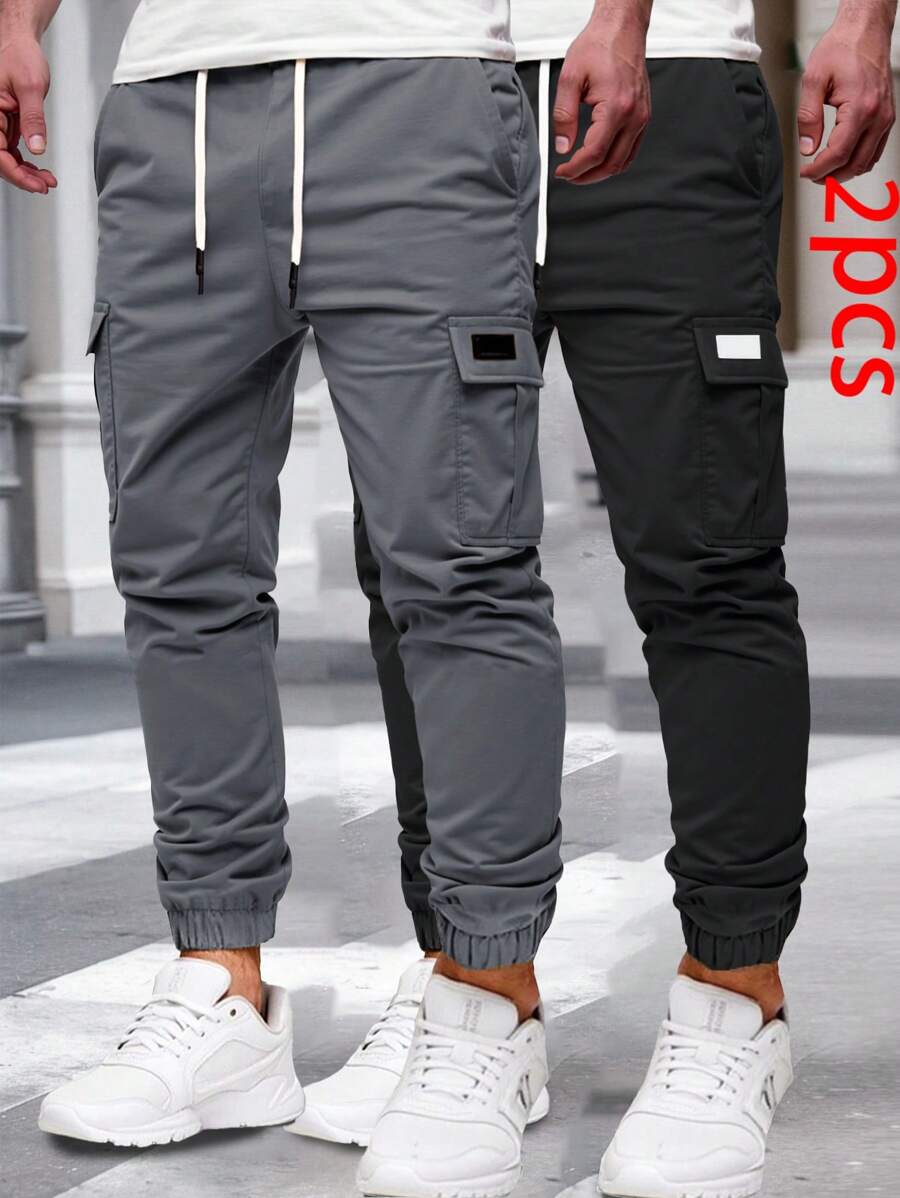 Manfinity Homme Pantalones cargo casuales de color liso y minimalistas con cordones para hombres