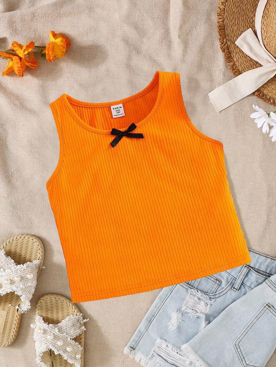 SHEIN Parte superior de tirantes con lazo frontal en estilo casual de calle para niñas preadolescentes