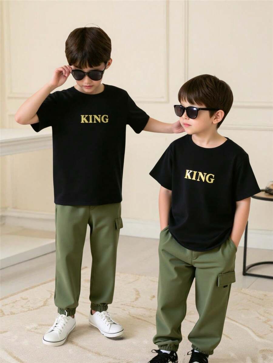 SHEIN Set de 2 piezas de camiseta de manga corta y pantalones jogger casuales y cómodos para niños pequeños, adecuado para usar en primavera y verano al aire libre