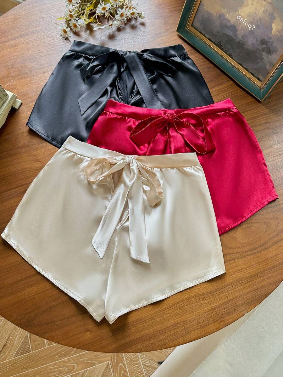 SilkySpell Set de 3 piezas de pantalones de pijama de satén con decoración de lazo en la parte trasera