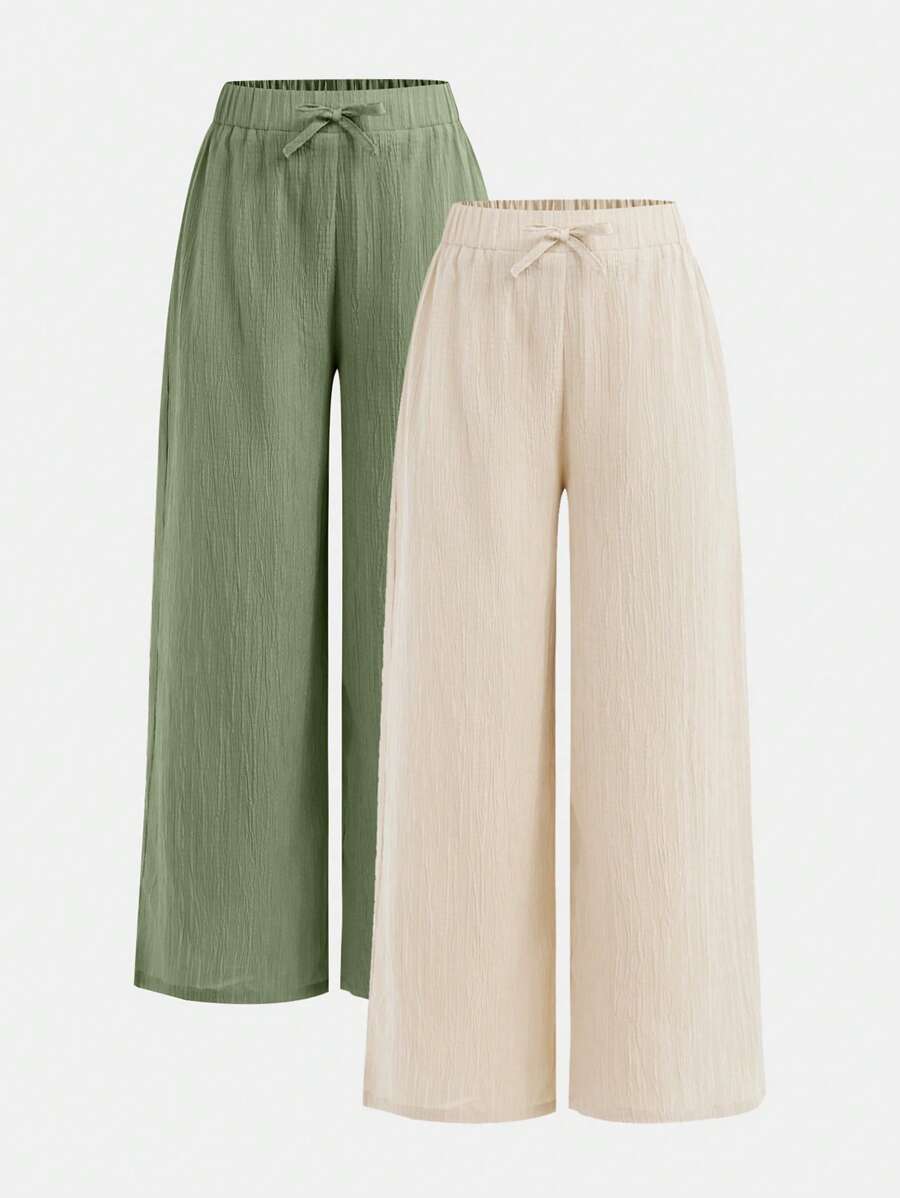 SHEIN Set de 2 pantalones anchos de pierna ancha con textura tejida y moño casual para niñas preadolescentes, estilo vacacional
