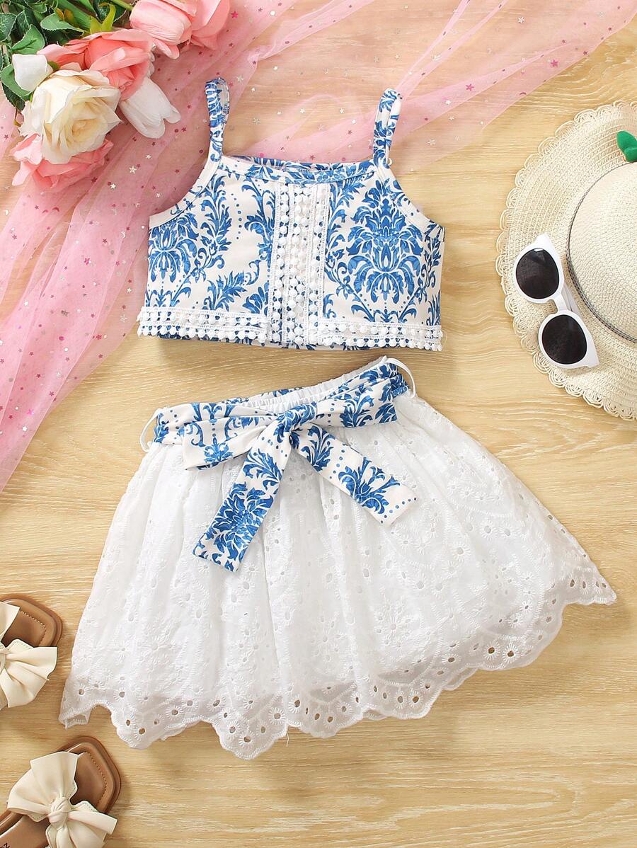 SHEIN 2pcs Set Young Girl Vacation Plant Print Camisole Top And Embroidered Hem Mini Skirt