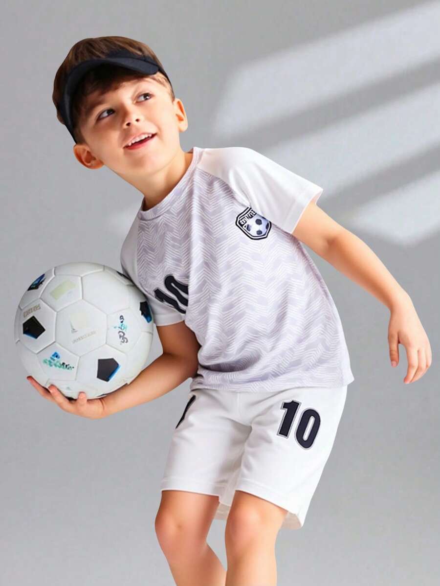 SHEIN Set de 2 piezas con camiseta de manga corta raglán con estampado de letras y pantalones cortos para niños