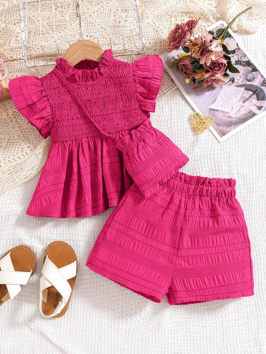 SHEIN Set de 2 piezas para niñas que incluye: Suéter de punto recogido + Pantalones cortos sueltos de tejido sólido + Bolso de asa diagonal