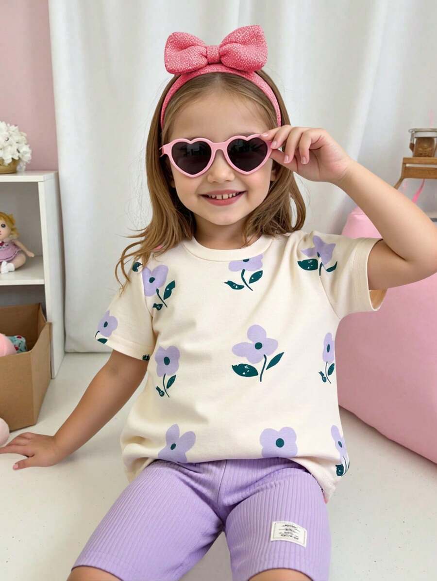 SHEIN Conjunto de Ramadán de 2 piezas para niñas con camiseta de manga corta de cuello redondo con estampado floral y pantalones ajustados a rayas, atuendo casual y dulce de verano
