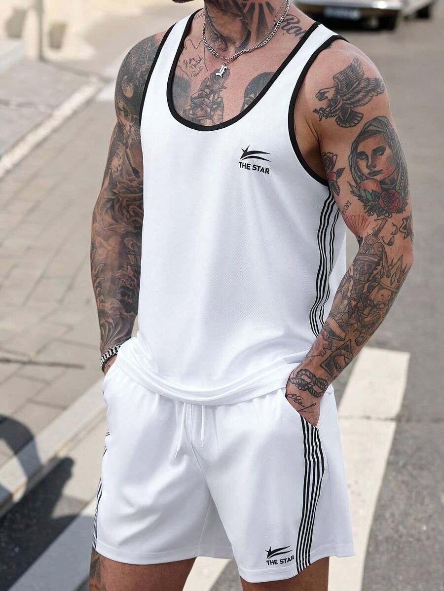 Manfinity Homme Conjunto de top de tirantes deportivos y shorts con rayas de colores contrastantes para hombre