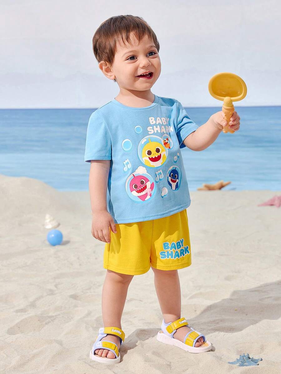 BABY SHARK X SHEIN Baby Boy Cartoon Shark Print Blue Casual Cute Short Sleeve T-Shirt And Yellow Loose Shorts Set