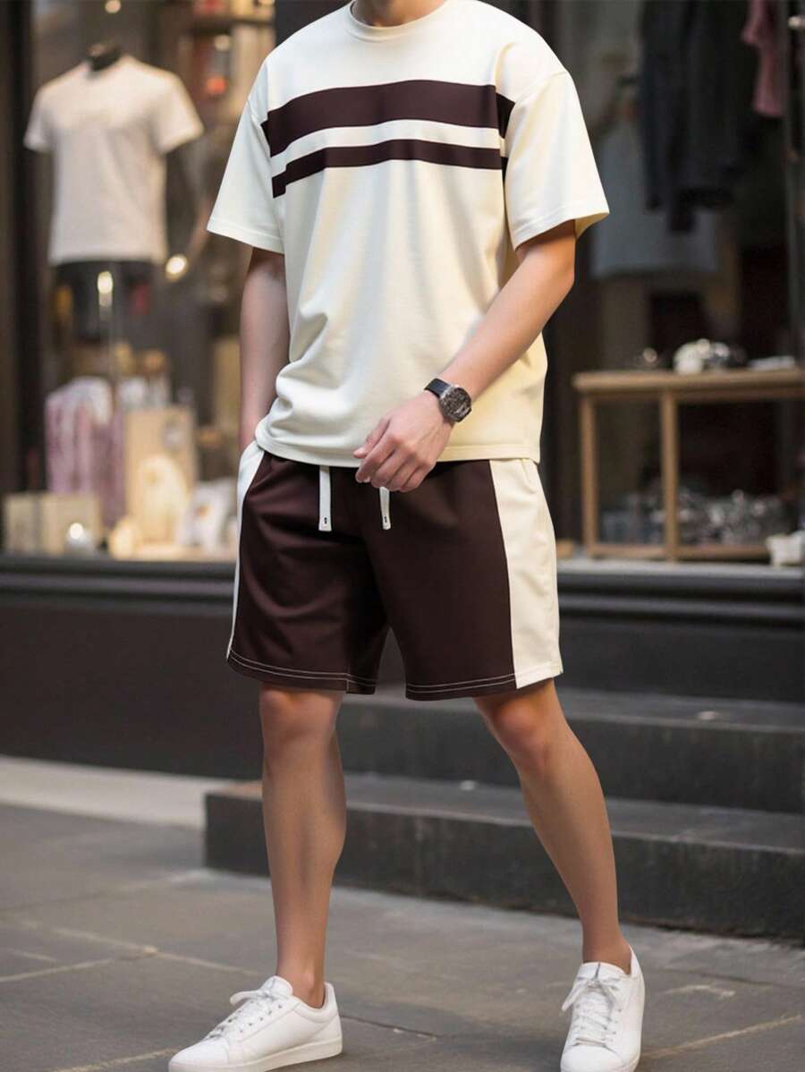 Manfinity Homme Conjunto informal para hombres de camiseta de manga corta con cuello redondo, estampado de rayas y palmas, y shorts con cordón en la cintura