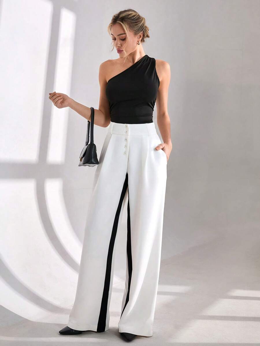 CLARA VERO Pantalón de pierna ancha con botones en la cintura alta, pantalón con paneles de contraste blancos, pantalón de bloques de color de diseñador, pantalón de pierna ancha de dos tonos elegante, pantalón de colección de ropa formal, colección de pierna ancha de alta moda, pantalón de ropa de noche sofisticada, pantalón de colección de diseñador de lujo, pantalón de declaración de uso profesional