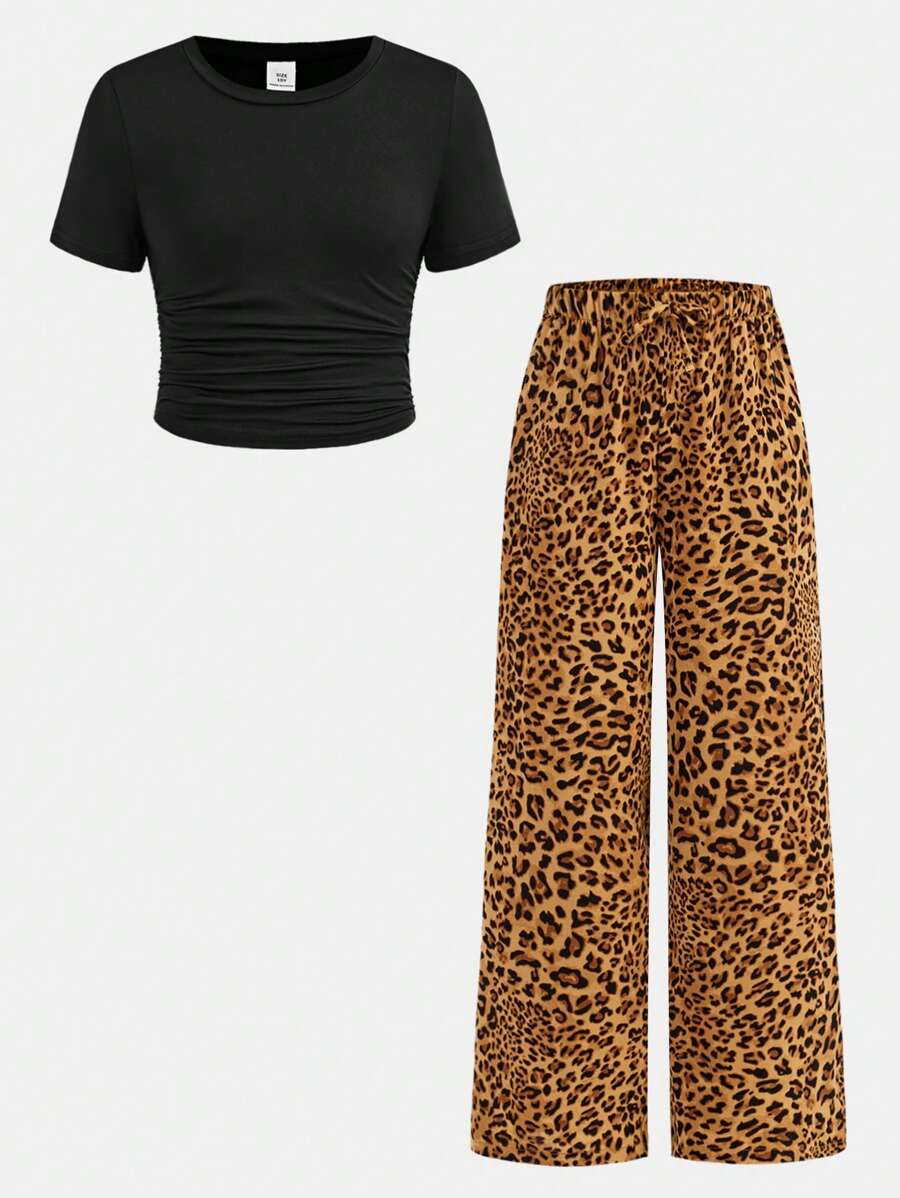 SHEIN Conjunto informal de niña preadolescente con camiseta de cuello redondo de manga corta en unicolor y pantalones anchos con estampado de leopardo