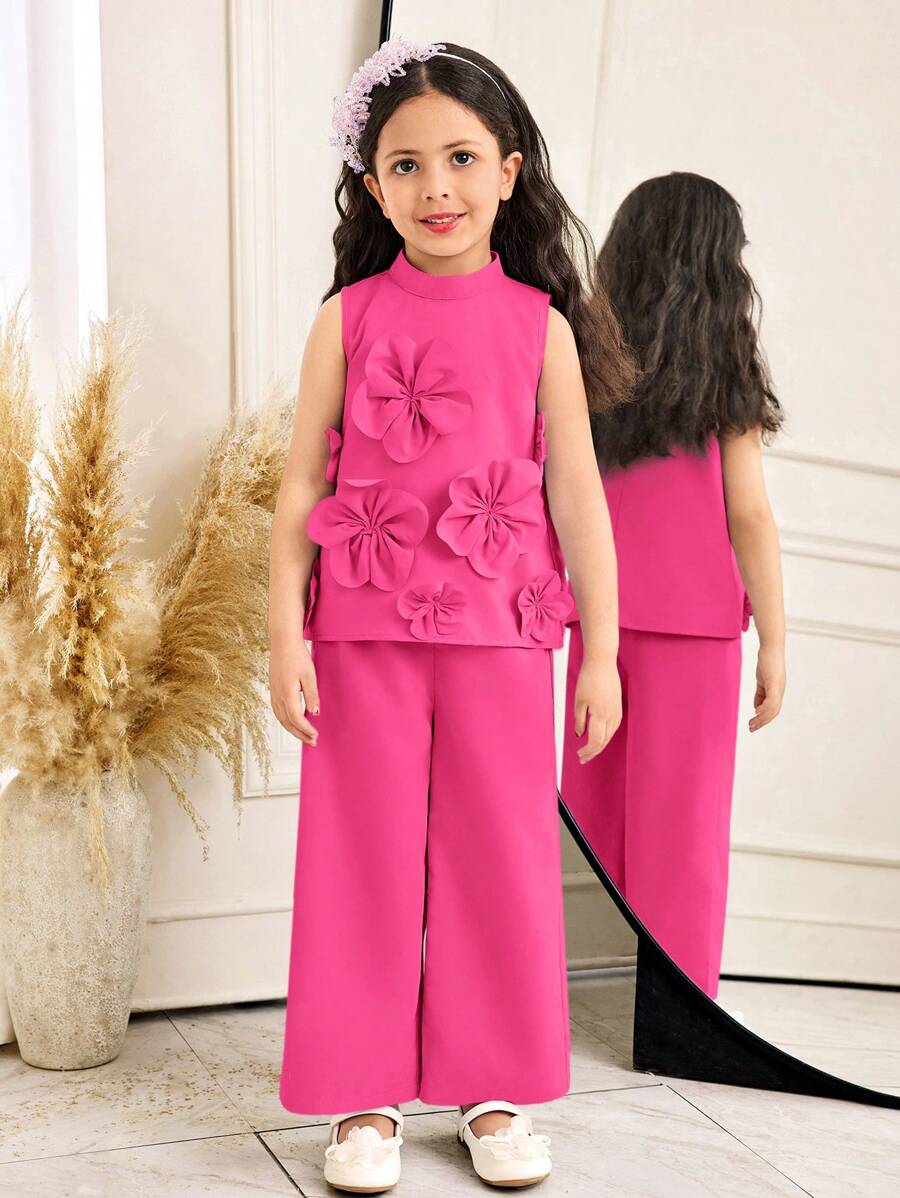 Set de 2 piezas compuesto por top con cuello de pie y pantalones con adornos florales elegantes para niña joven
